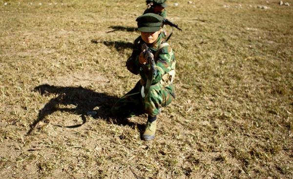 A picture made available on 20 November 2016 shows female soldiers of Kachin Independence Army (KIA) in action during the training session at a military camp near Laiza, Kachin State, northern Myanmar, 19 November 2016. Photo: Seng Mai/EPA