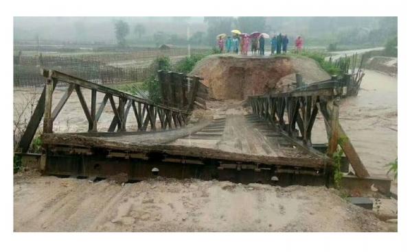 မိုးသည်းရေကြီးမှုကြောင့် နမ္မတူမြို့နယ်အတွင်းနေအိမ်များရေလွှမ်း တံတားတစင်းကျိုးကျပျက်စီး (photo/Numtu Youth)