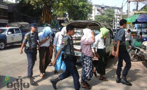 The accused in the Rohingya calendar case appear for the third time at Yangon’s Pazundaung Township Court on 16 December 2015. Photo: Zaw Kham Hein/Mizzima