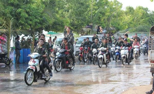 A group on motorcycles at Thingyan festivities in Moulmein, Mon State