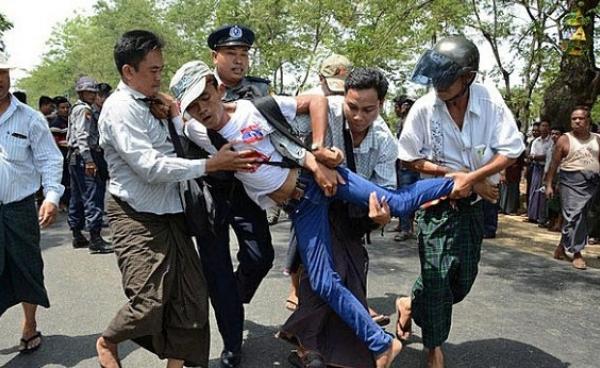 A Myanmar protester demanding labour rights is arrested by police in Tatkon township outside the capital Naypyidaw
