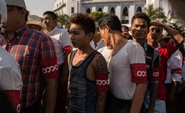 A group of Vigilantes Wearing Red Arm-Bands That Say 'Duty' in Burmese (Photo: The Irrawaddy)