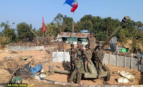 AA troops celebrating after capturing Taungshay hill tactical operation command near Tinma village, Kyauktaw Township