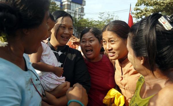 Political activist Naw Ohn Hla (C) is reunited with her friends after her release from Insein prison in Yangon, Myanmar, 17 April 2016. Photo: Nyein Chan Naing/EPA