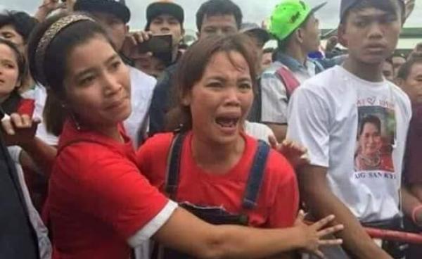 Burmese workers outside Talay Hall upset because they were unable to see Aung San Suu Kyi