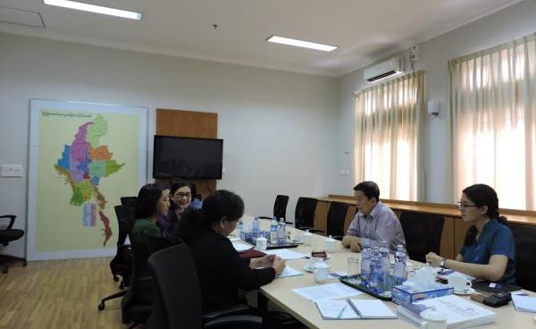 Members of the Alliance for Gender Inclusion in the Peace Process (left) meet with Peace Commission chairperson Dr Tin Myo Win (second from right) at the National Reconciliation and Peace Centre office in Rangoon.