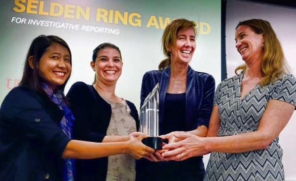 Left to right: AP’s Esther Htusan, Margie Mason, Robin McDowell and Martha Mendoza receive the Selden Ring Award for Investigative Reporting from USC Annenberg in Los Angeles on Friday, April 15, 2016.