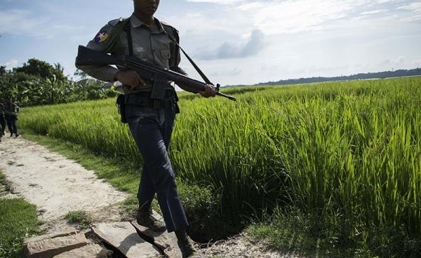 Armed police conduct search operations at Warpait village in Maungdaw, located in Rakhine State, on October 14, 2016 as the government announced that terror groups were behind the series of attacks. Photo: Ye Aung Thu/AFP