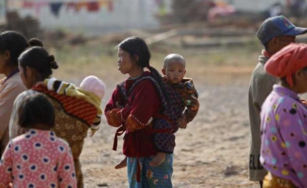 ရှမ်းပြည်မြောက်ပိုင်း၊ ကျောက်မဲတွင် တအာင်းတပ် နှင့် အစိုးရတပ်တိုက်ပွဲကြောင့် ထွက်ပြေးတိမ်းရှောင်လာသူများကိုတွေ့ရစဉ်။ (ဓာတ်ပုံ-ဟိန်းထက်/အီးပီအေ)