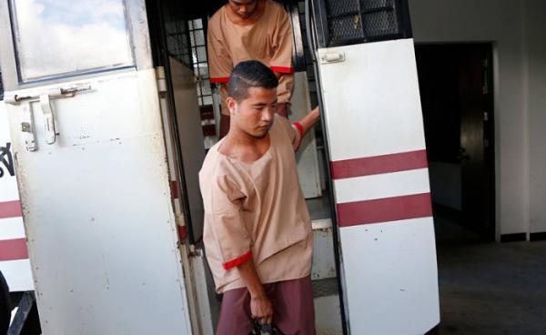 Found guilty - Myanmar migrant workers Zaw Lin (front) and Wai Phyo (back) arrive for their murder case verdict at the Samui Provincial Court on Koh Samui Island, Surat Thani province, southern Thailand, 24 December 2015. Photo: Rungroj Yongrit/EPA