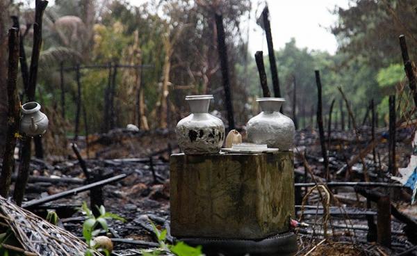 The burnt down area after attackers leave Wa Beik village near Maungdaw town of Bangladesh-Myanmar border, Rakhine State, western Myanmar, 13 October 2016. Photo: Nyunt Win/EPA