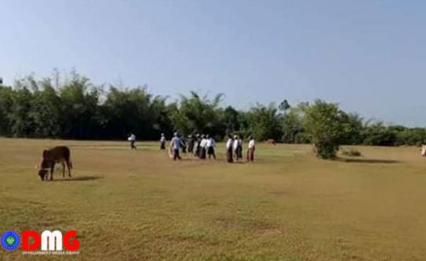 Concerned officials look at virgin lands for construction of government offices in Ashae Phat Hmaw Village. (Photo - Ko Maung Maung Gyi)