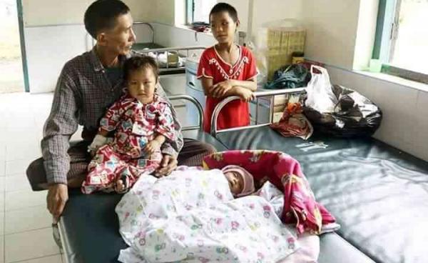 ဆေးကြောင်ဖခင်မှလိုက်ခုတ်သဖြင့် ဒဏ်ရာရသောသမီးလေး ဆေးရုံရောက် ။ အဖိုးနှင့်မြေးမ များပုံ။ Photo: Citizen Journalist