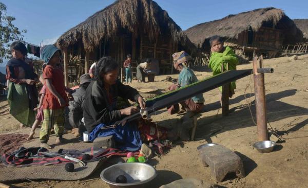 A Naga tirbeswoman weaving cloth in Lahal township, in the remote Sagaing region. Photo: Phyo Hein Kyaw/AFP