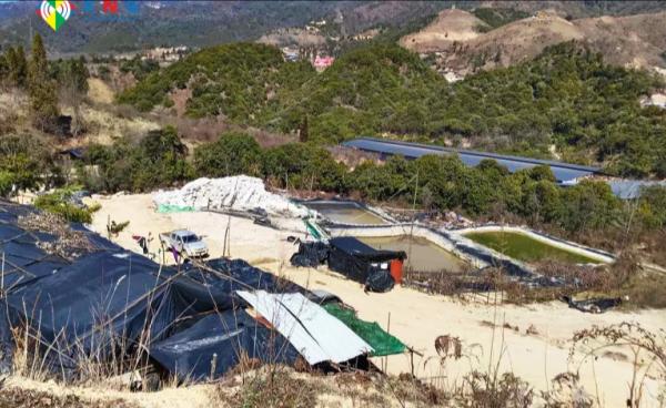 A rare earth metal (REM) mining site in Pang War Town