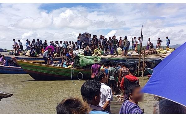 လက်နက်ကြီးများဖြစ်ပစ်ခတ်နေမှုကြောင့် လွန်ခဲ့သည့် လအနည်းငယ်က ရသေ့တောင်ဒေသခံများ ထွက်ပြေးနေကြစဉ် (ဓာတ်ပုံဟောင်း) ဓာတ်ပုံ-  CJ