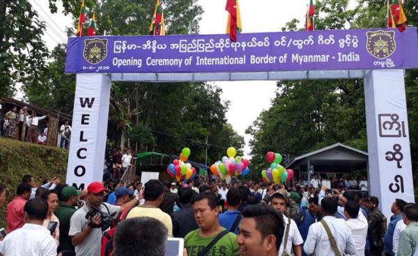 မြန်မာ-အိန္ဒိယ နှစ်နိုင်ငံနယ်စပ်ရှိ တမူး-မိုးရေး နှင့် ရိခေါဒေါ(ရ်)-ဇိုခေါသာ(ရ်)တို့တွင် အပြည်ပြည်ဆိုင်ရာ ဝင်၊ထွက်ဂိတ်များ တပြိုင်နက် ဖွင့်လှစ်ခဲ့ခြင်း ဖြစ်သည်။ရိခေါဒေါ(ရ်)-ဇိုခေါသာ(ရ်)တို့တွင် နယ်စပ်ဂိတ်ဖွင့်လှစ်စဉ်။ (Photo- India Embassy)