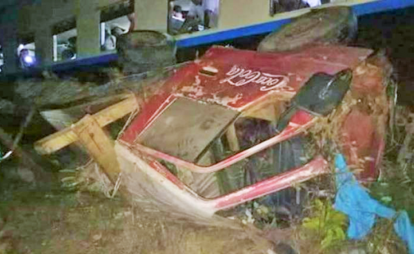 Crashed truck lied beside train track