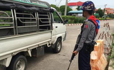 The Irrawaddy /Security personnel stand guard at an intersection in Naypyitaw on 19 Sept 19