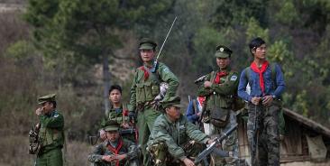 The new book Tracking the Transition covers an important juncture in Myanmar's drive for peace - Soldiers of the Ta'ang National Liberation Army (TNLA) in Myanmar's northern Shan State. Photo: Ye Aung Thu/AFP